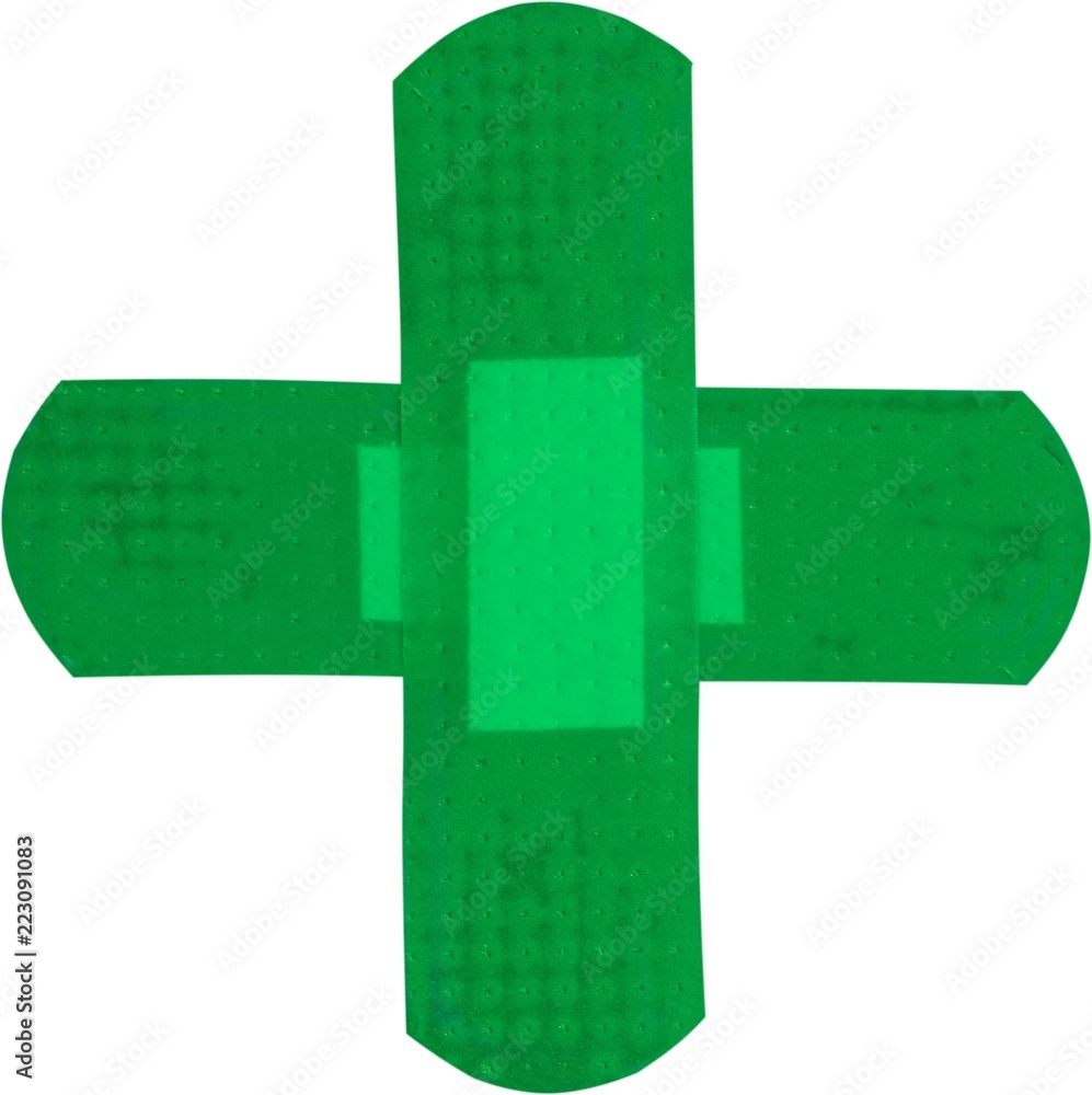 Fototapeta premium Crossed Green Sticking Plasters - Isolated