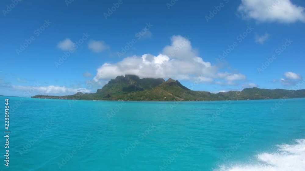 Sailing around blue lagoon and Otemanu mountain at Bora Bora island, Tahiti, French Polynesia (view from action camera)
Sailing around blue lagoon and Otemanu mountain at Bora Bora island, Tahiti, French Polynesia (view from action camera)