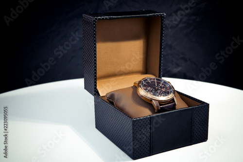 Luxury mens wristwatch displayed and packaged in a box