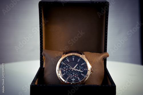 Luxury mens wristwatch displayed and packaged in a box