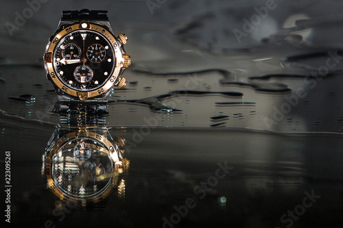 Luxury waterproof watches in water splashes