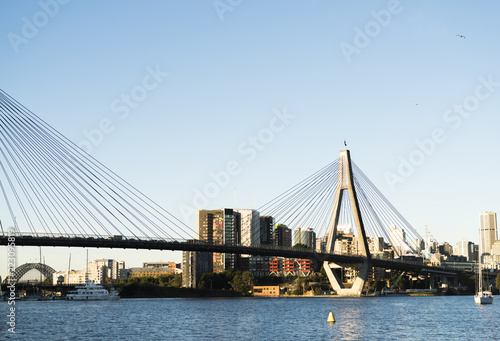 Peak hour on Anzac Bridge, Sydney, Australia. Water views to Sydney Harbour Bridge