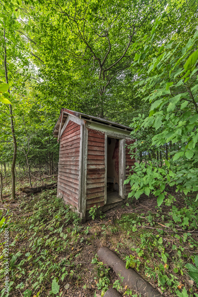 Faded Red Outhouse
