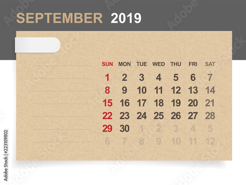 September 2019 - Monthly calendar on brown paper and wood background with area for note. Vector.