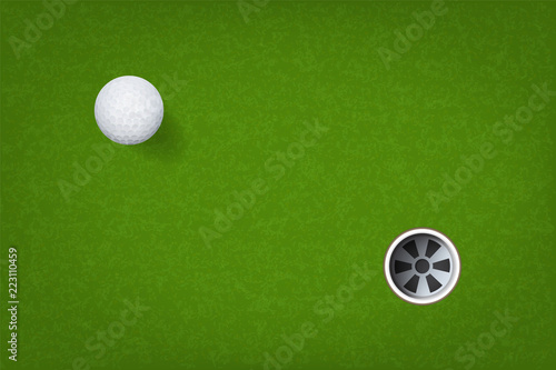 Golf ball and golf hole on green grass background. Vector.