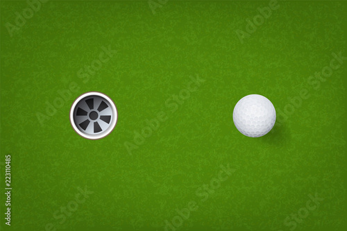 Golf ball and golf hole on green grass background. Vector.