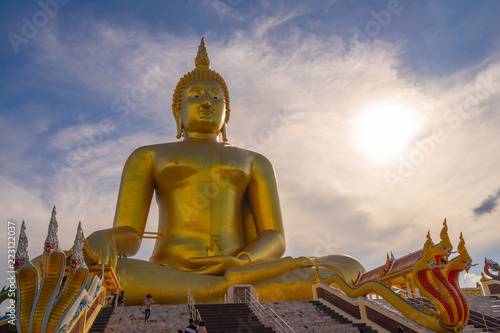Big golden Buddha, Wat Muang Angthong popular Buddhist shrine in Thailand.