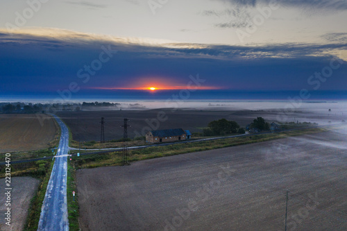 Misty morning in latvian countryside.