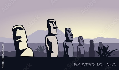 The landscape of Easter island with the famous sculptures at dusk
