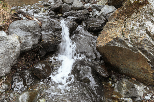 water stream running over rocks © fotofabrika