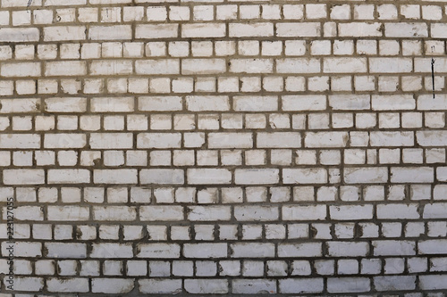 Wall of white old brick. Backgrounds, texture