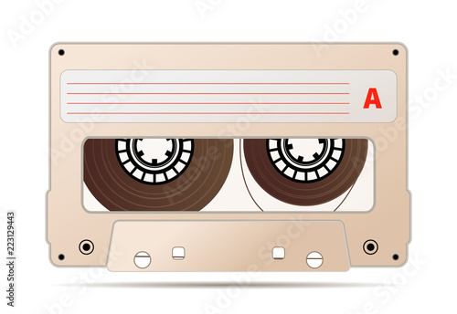 Detailed beige audio cassette with magnetic tape, vintage object isolated on white