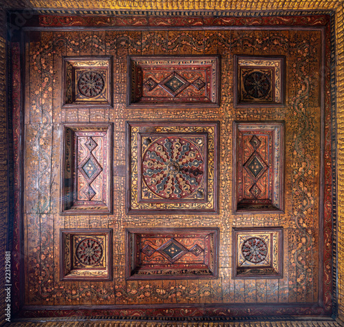 Ottoman era decorated wooden ceiling with golden floral pattern decorations at historic House of Egyptian Architecture, located in Darb El Labbana district, Cairo, Egypt
