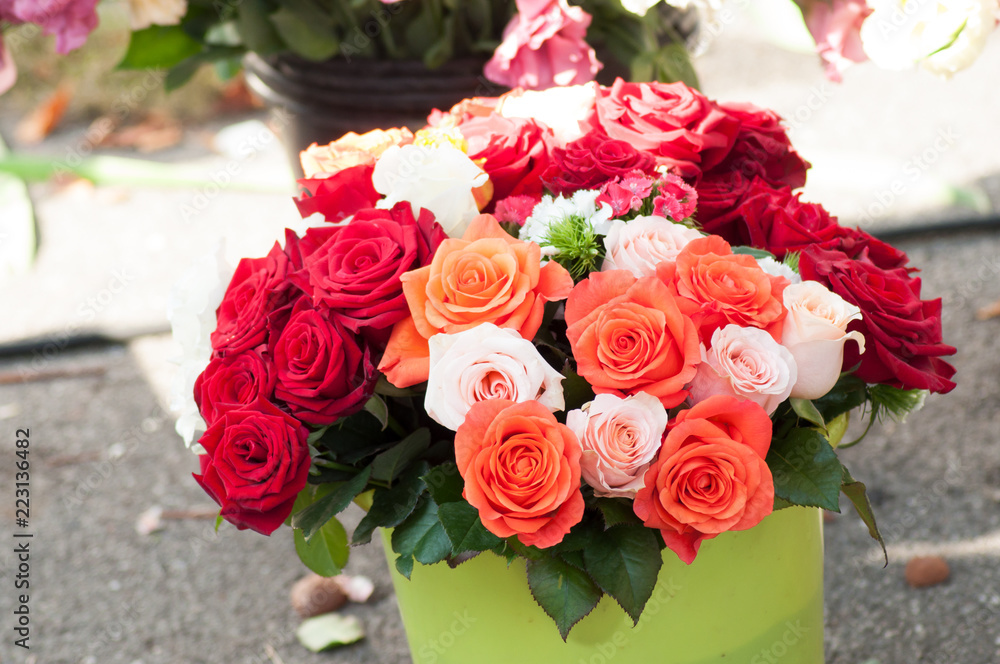 closeup of colorful roses bouquets at the market