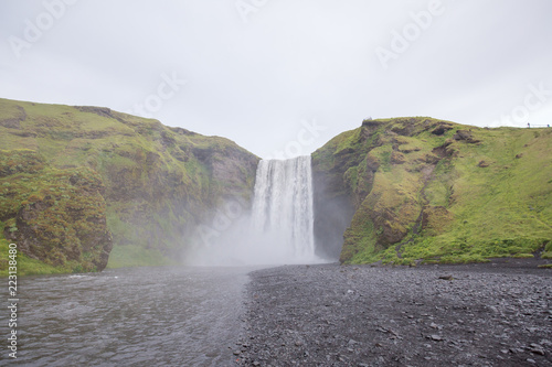 waterfall in iceland in the mountain