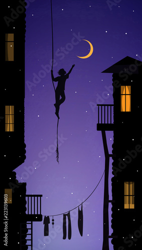 boy hanging on the rope and touching the moon, catch the dream in the city,