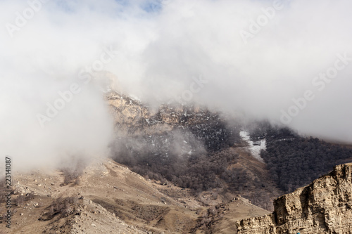 beautiful winter mountains of the Kavkaz in the clouds