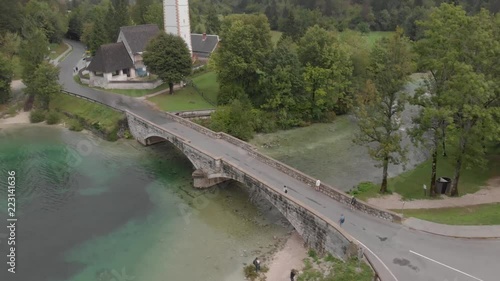 Wallpaper Mural Aerial view of church and bridge near the Bohinj lake. Beautiful clouds and blue water. Torontodigital.ca