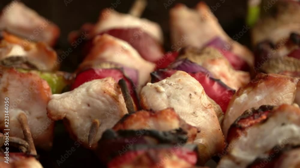 pork shish kabobs on the grill on BBQ background. Slow motion
pork shish kabobs on the grill on BBQ background. Slow motion