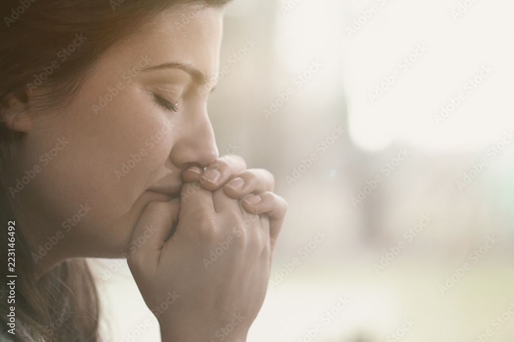Lonely and depressed sad woman with hands on face Lonely and depressed sad woman with hands on face