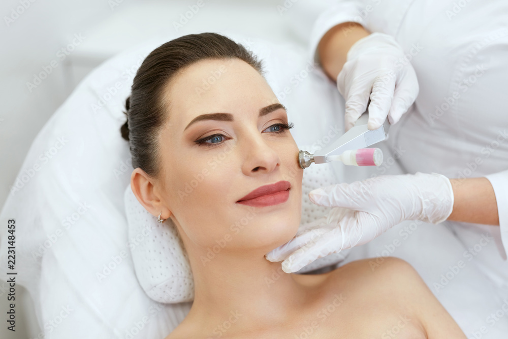 Beauty Clinic. Woman Doing Face Skin Cryo Oxygen Treatment