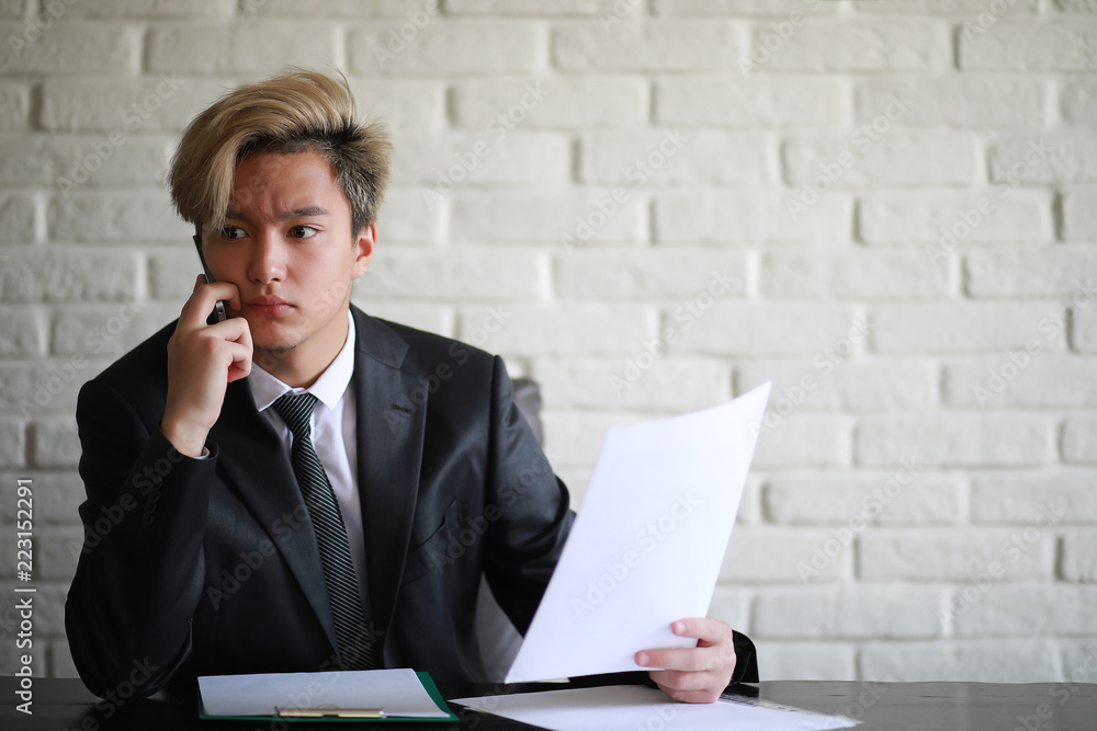 Young Asian businessman in white shirt and tie Young Asian businessman in white shirt and tie