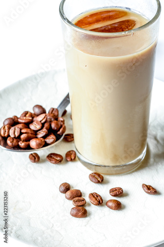 coffee with ice in glass on white background