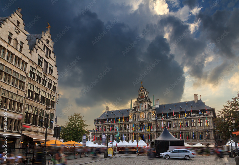 Ominous clouds Antwerp city hall at the great market square (Grote Markt) in Belgium on a stormy summer day

