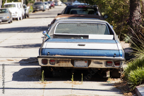 Rear view of a classic vintage American car in the street