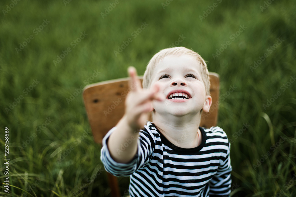 portrait of a young boy outdoors portrait of a young boy outdoors