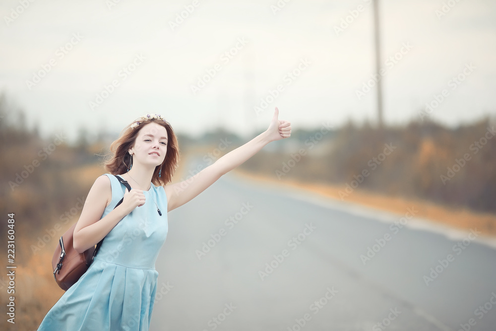 Young girl on a walk in the autumn Young girl on a walk in the autumn