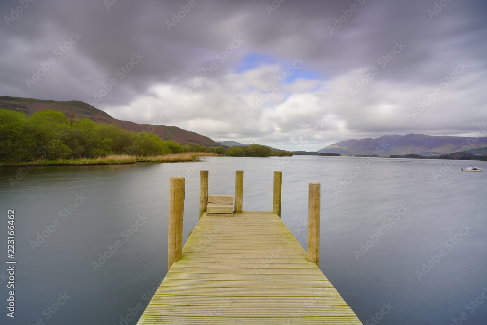 a view of platty plus jetty lake at derwentwater lake in lake district national park united kingdom