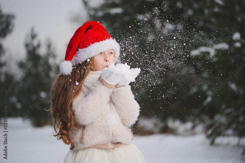 little happy beautiful girl in winter forest little happy beautiful girl in winter forest