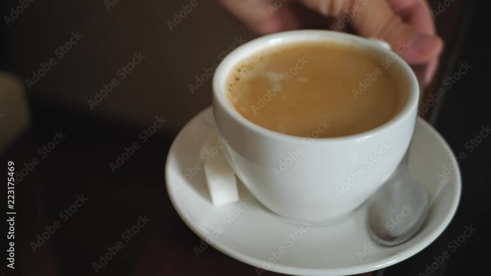 Cup of cappuccino, cup of coffee on brown wooden table. Cup of cappuccino, cup of coffee on brown wooden table.