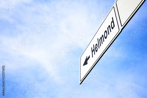 Signboard pointing towards Helmond