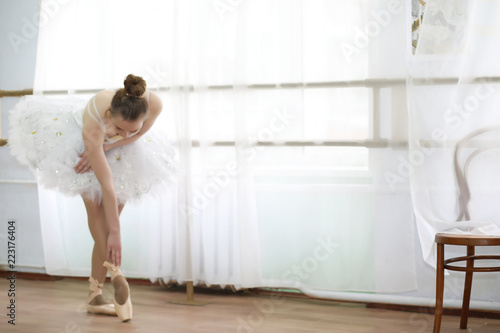 Pretty girl ballet dancer practicing