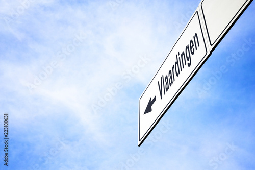 Signboard pointing towards Vlaardingen