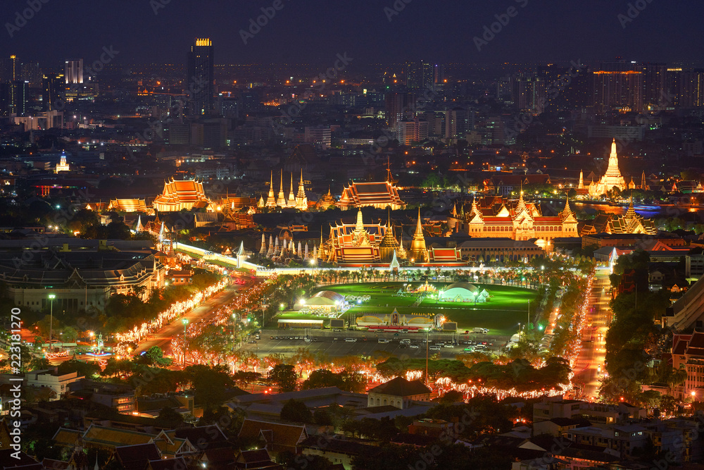 aerial view of royal grand palace and night cityscape background