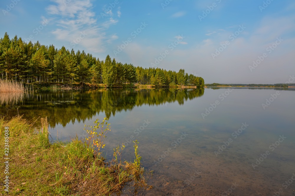 Artificial lake formed after the removal of sand. Closed sand quarry.