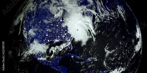 Extremely detailed and realistic high resolution 3D illustration of a Hurricane at Night hitting the US East Coast. Shot from Space. Elements of this image are furnished by Nasa.