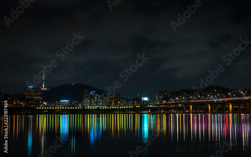 Bridge with colorful lights and N Seoul Tower in the background