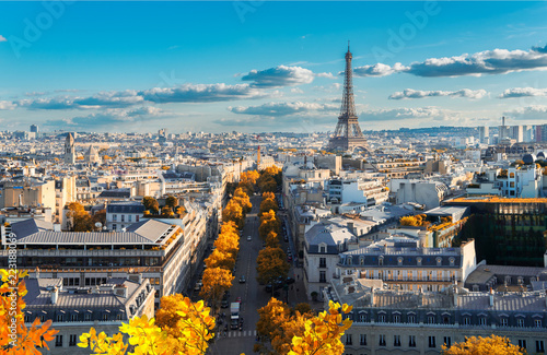 panoramic view of famous Eiffel Tower and Paris roofs at fall, Paris France