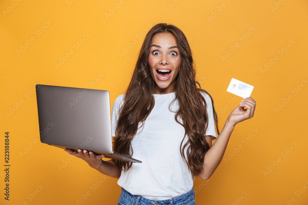 Portrait of an excited young girl with long brunette hair Portrait of an excited young girl with long brunette hair