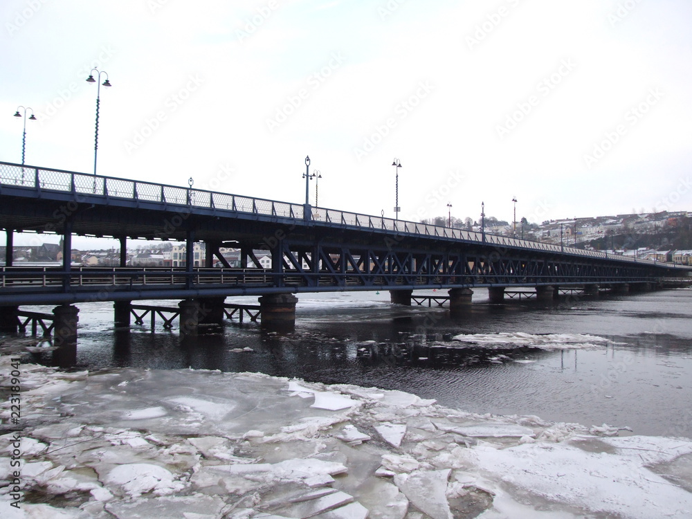 The Craigavon Bridge and River Foyle in Derry Londonderry frozen