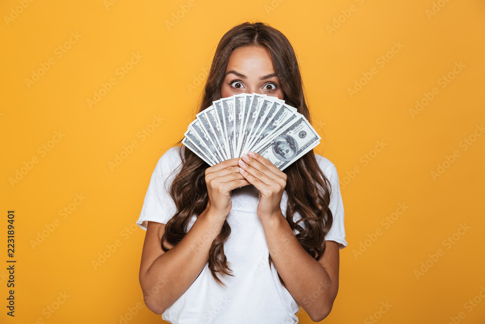 Portrait of a happy young girl with long brunette hair Portrait of a happy young girl with long brunette hair