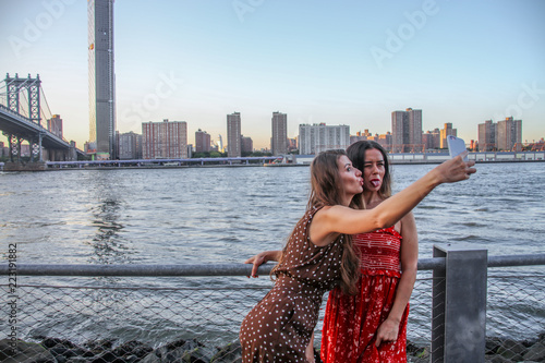 Women taking selfie in NYC in Park