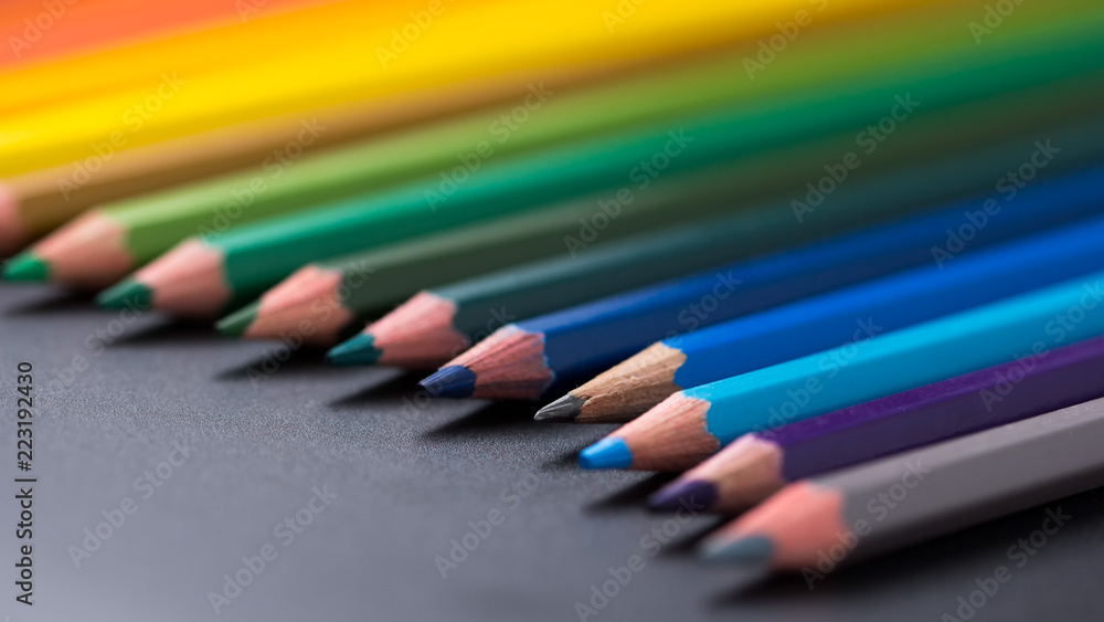 color Pencils success creative concept On Black Background Close-up.. color Pencils success creative concept On Black Background Close-up..