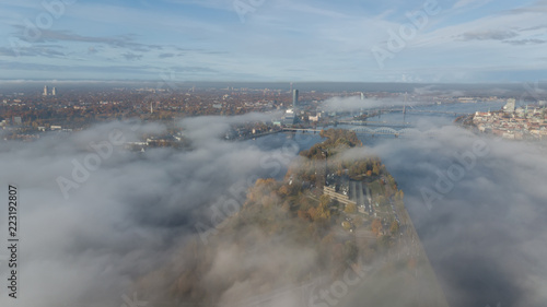 Riga Latvia Daugava river Zakusala island smoke cloud island Aerial drone top view photo