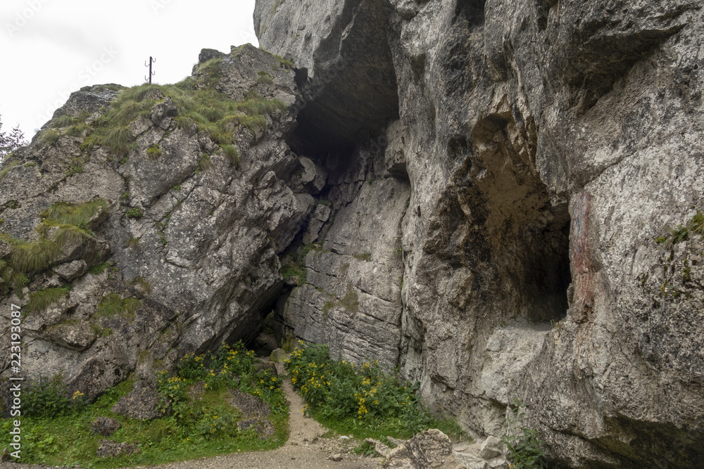 View of Bear's cave entrance, near Tatarului Gorges,  Bucegi mountains, Romania,  Bucegi national park