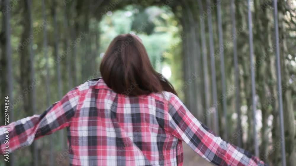 The woman runs off into the distance. He laughs, turns away and runs. The girl has long red hair The woman runs off into the distance. He laughs, turns away and runs. The girl has long red hair
